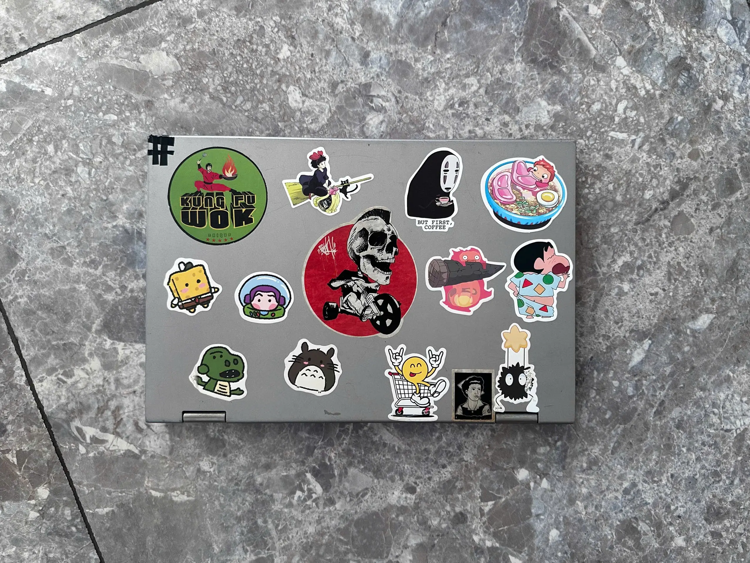 My Inspiron laptop covered with stickers