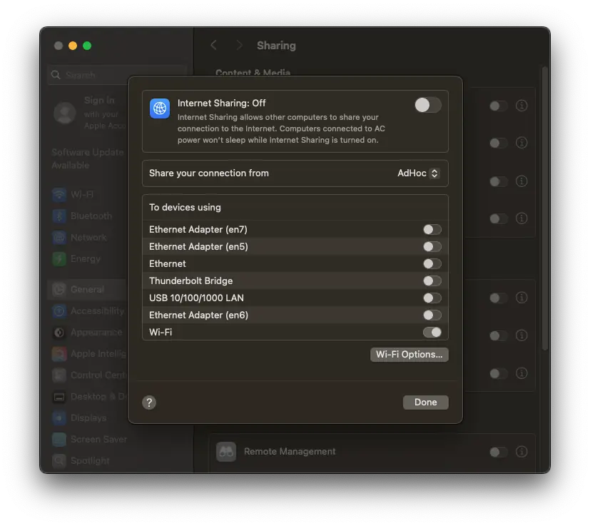 MacOS Settings window with the Internet Sharing configured with the AdHoc interface